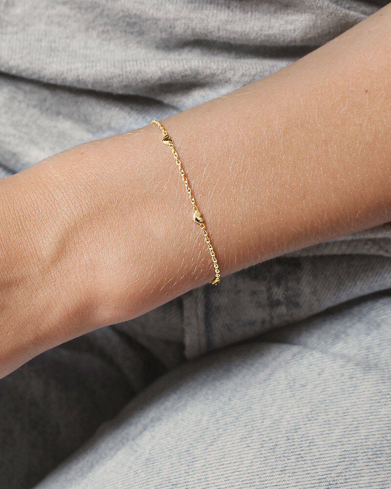 Loving heart drop full armband guld