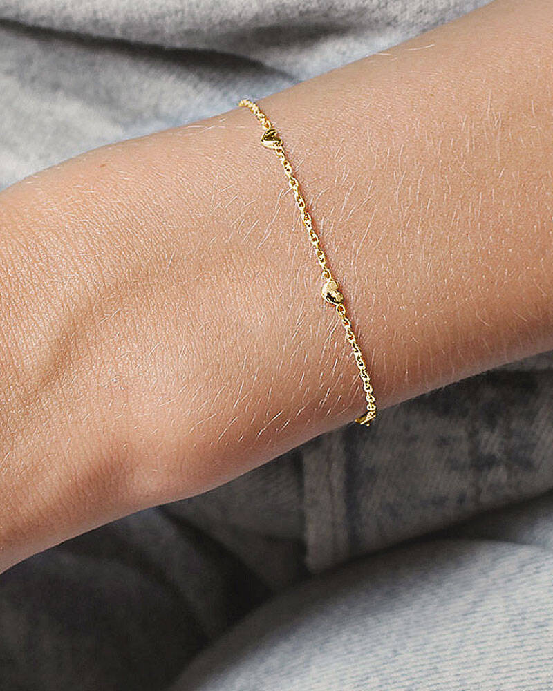 Loving heart drop full armband guld