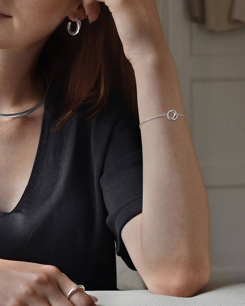 Orbit drop armband silver